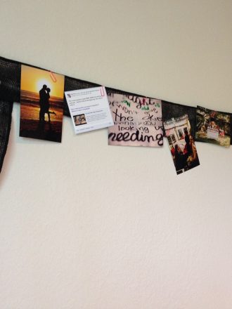 black burlap ribbon used to hang pictures and quotes on the wall