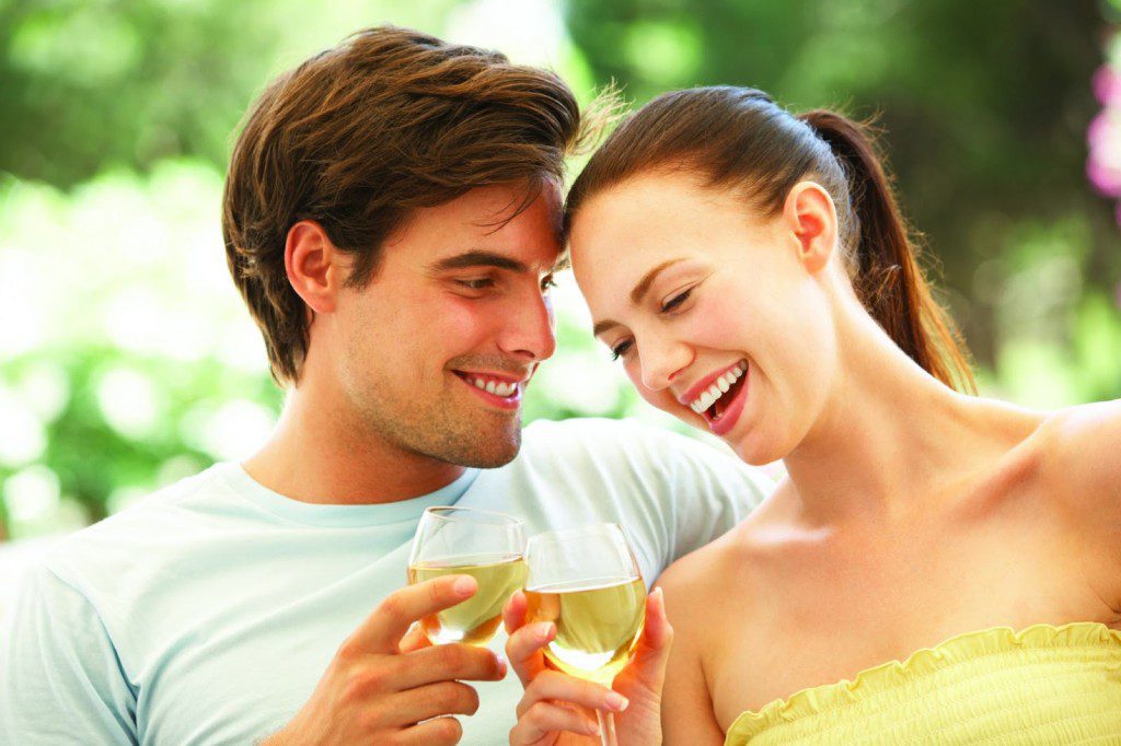 Couple drinking white wine