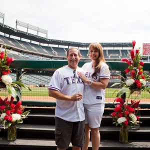 red flowers baseball roses proposal in stadium sports