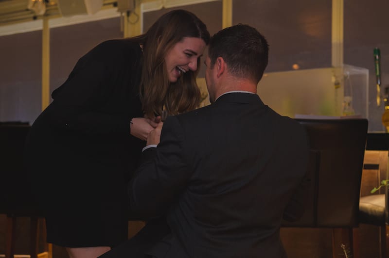 thoughtful marriage proposal on rooftop in nyc