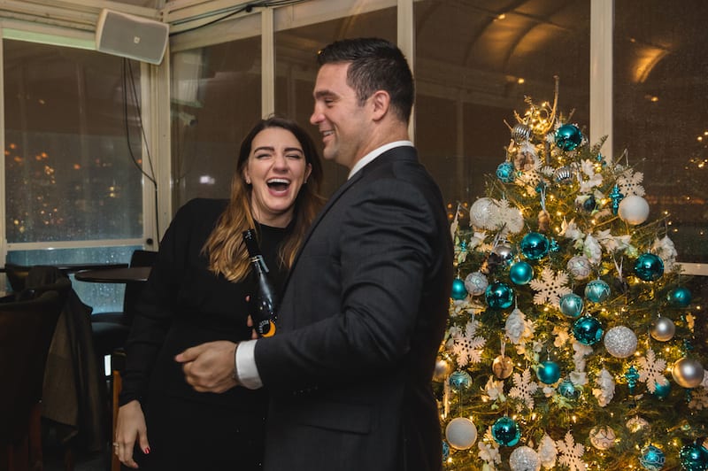 Christmas marriage proposal on rooftop in nyc