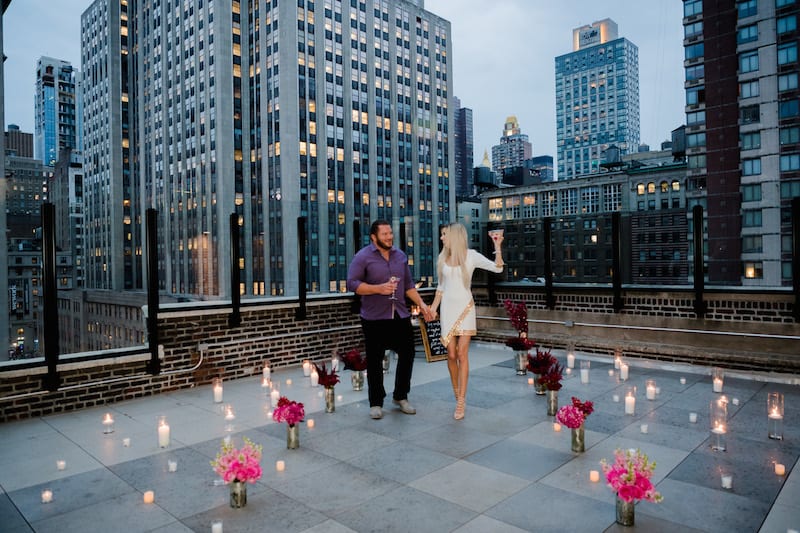 Rooftop Proposal in NYC with view of Empire State Building