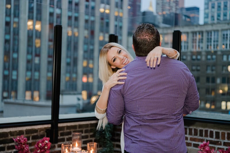 Rooftop Proposal in NYC with skyline view