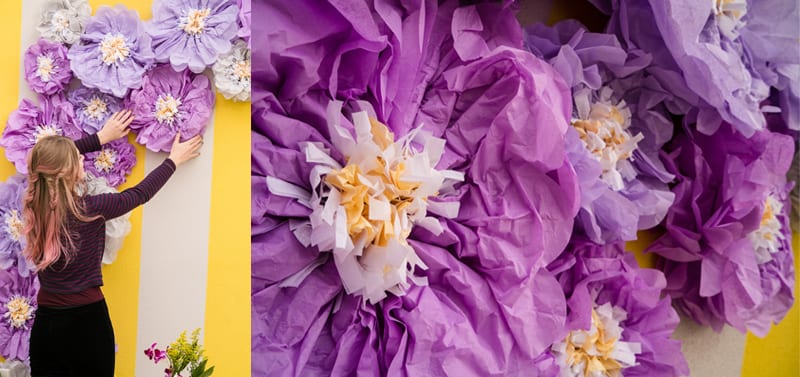 purple paper flowers in archway