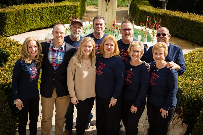 family in matching t-shirts for proposal