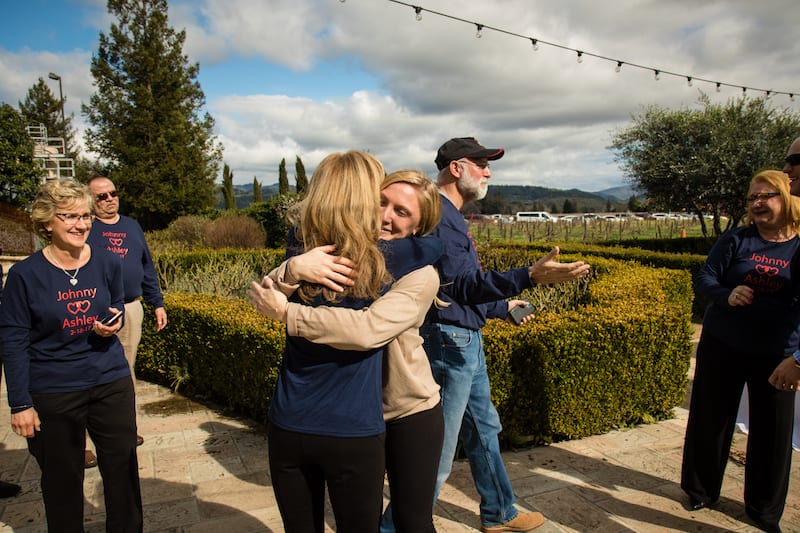 girl sees her family for the first time during proposal