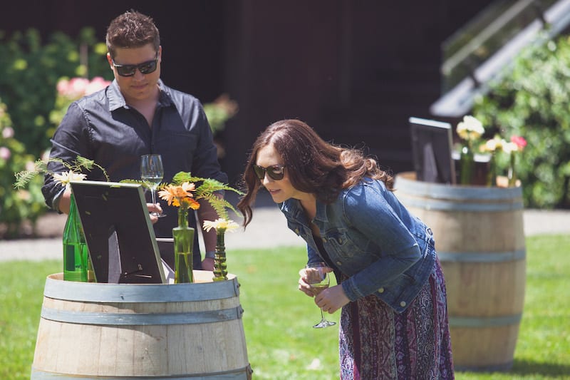 flowers and frames on wine barrels