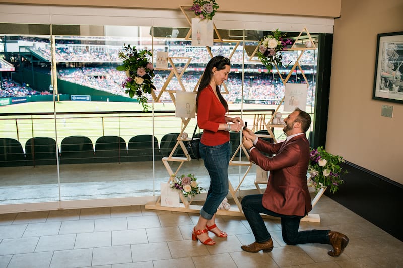 proposal at baseball stadium suite 