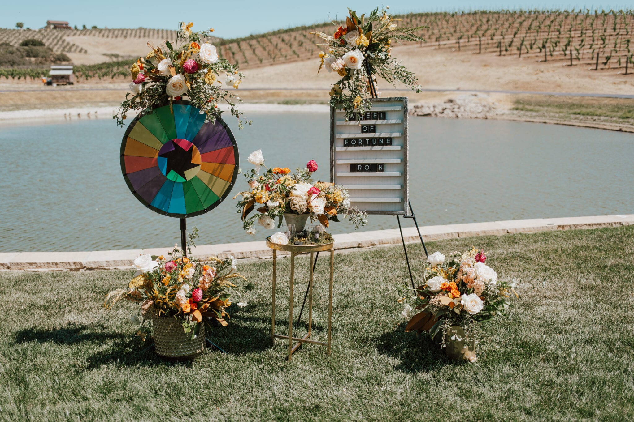 Spin wheel and letter board with colorful flowers