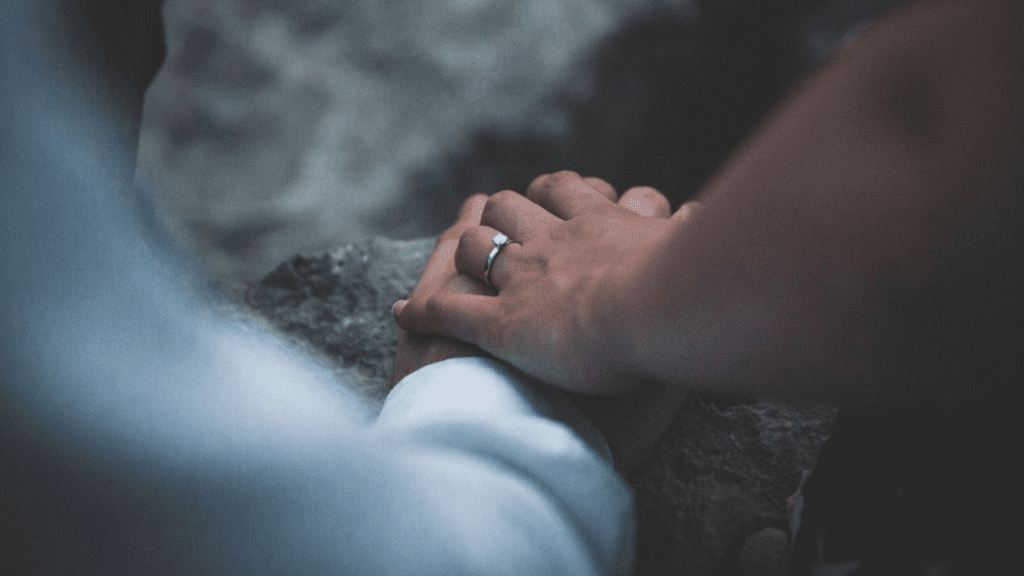 Couple Holding Hands with ring