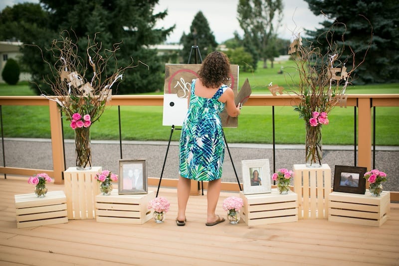 women putting together puzzle