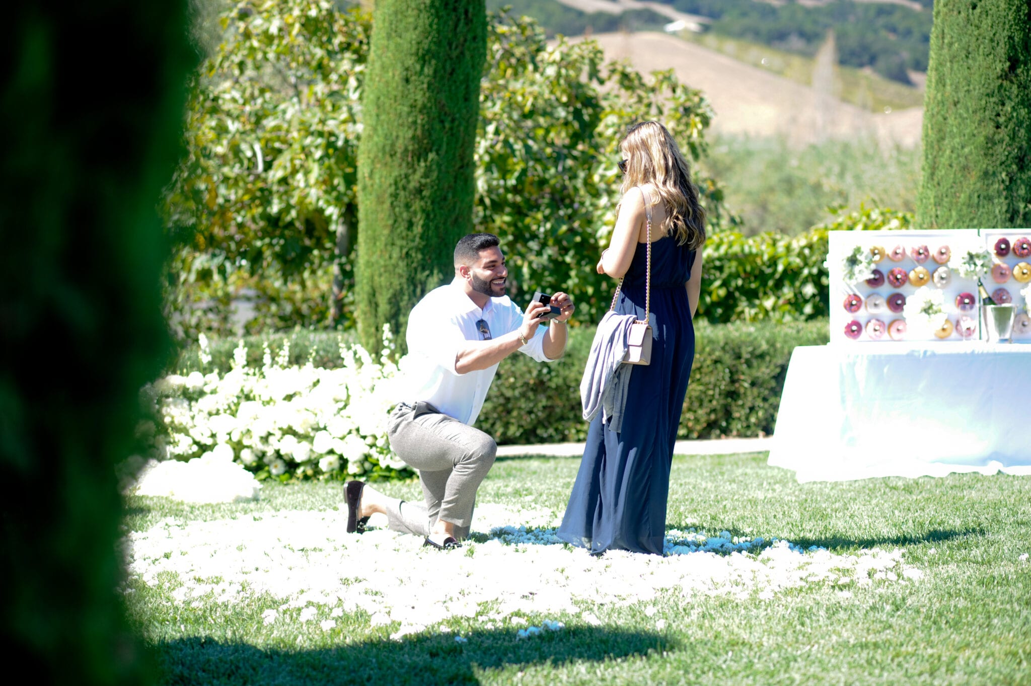 donut wall proposal with white flowers