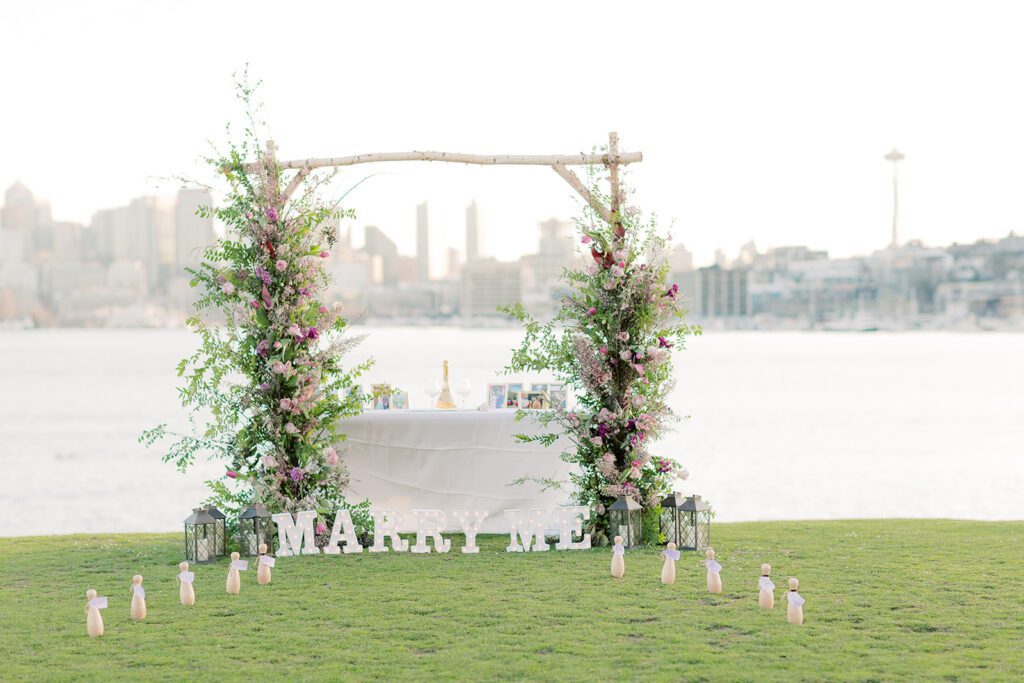 flower arch marry me sign