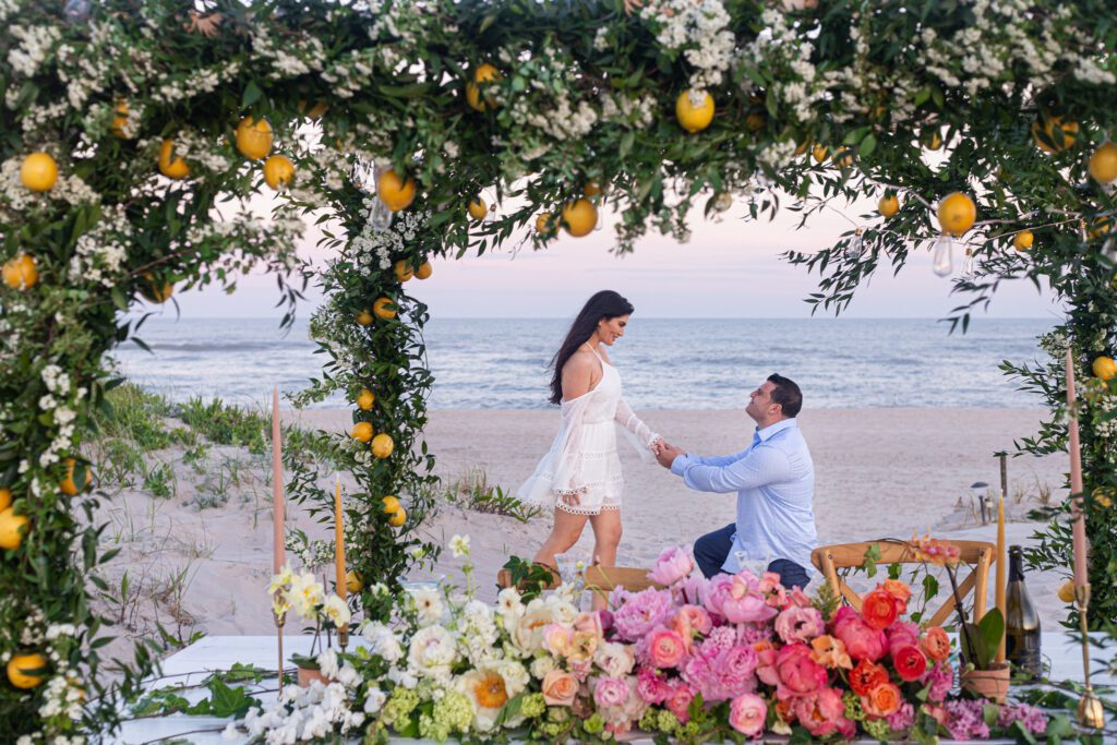 Colorful flowers private beach man on one knee in the hamptons