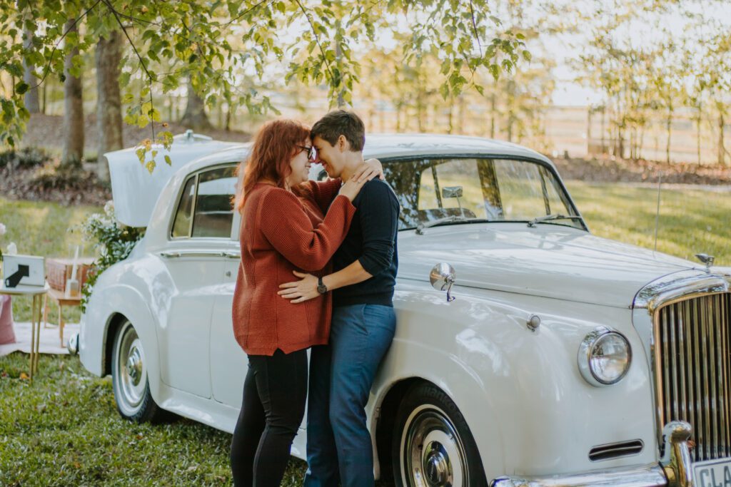 Couple posing against vintage car- Roopville, Georgia Proposal
