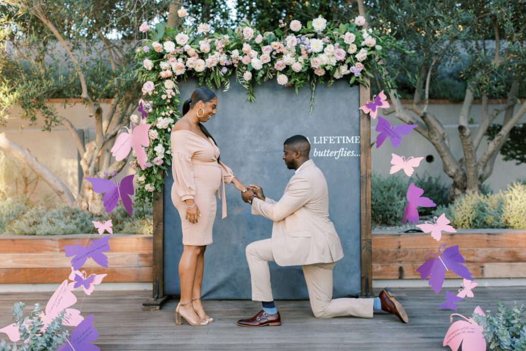 man proposing in front of backdrop