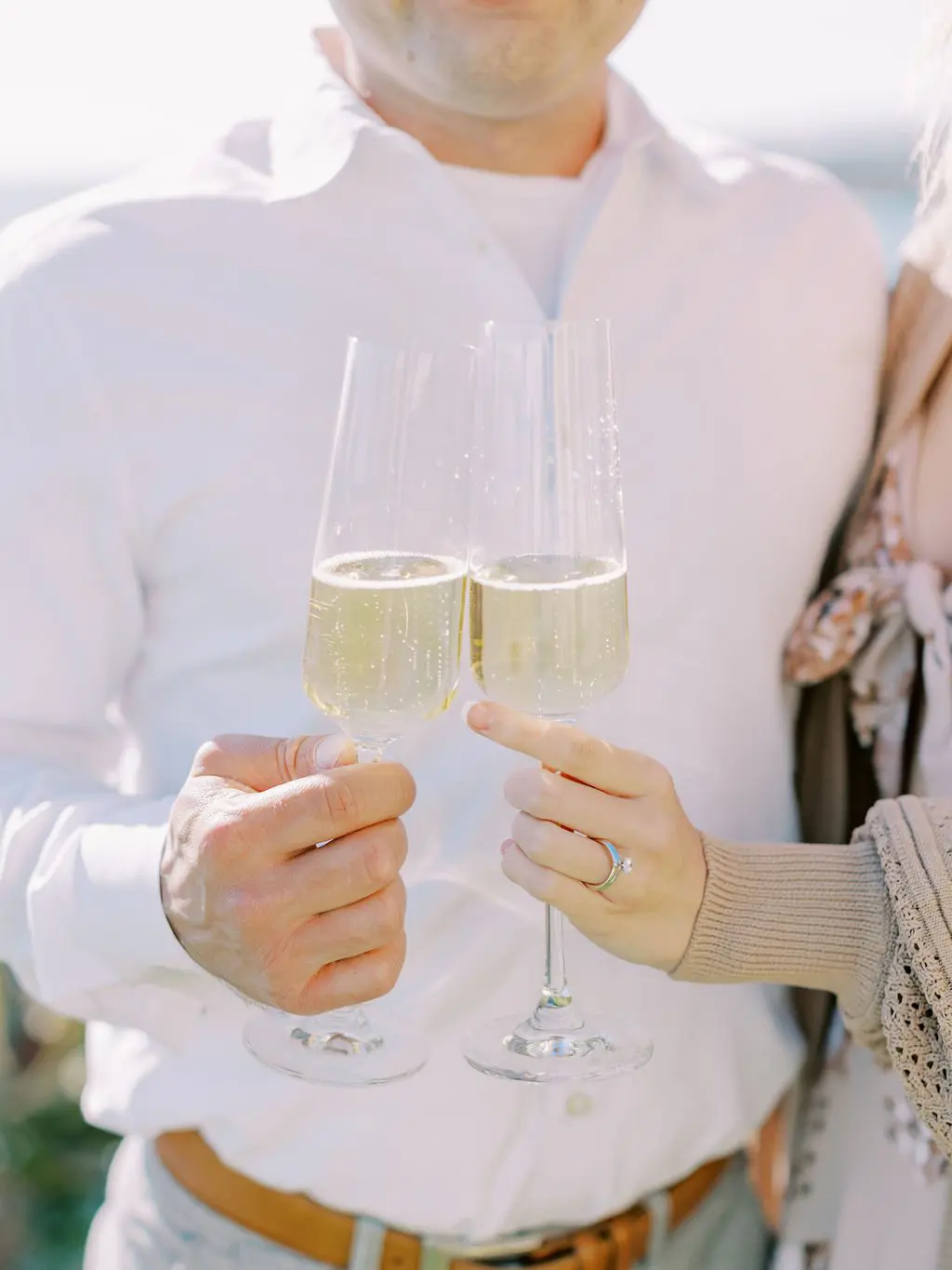 Couple cheering champagne