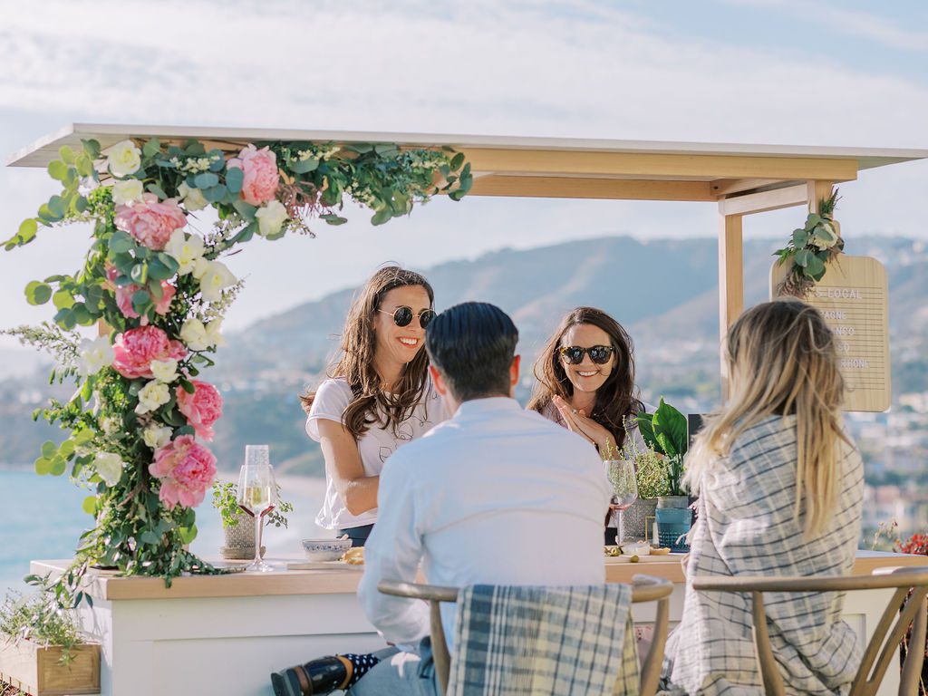 Couple enjoying wine tasting with Yes Local