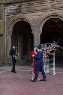 Couple dancing in central park right after marriage proposal