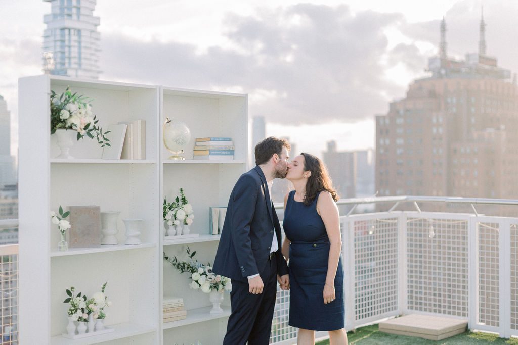 newly engaged couple kissing in new york