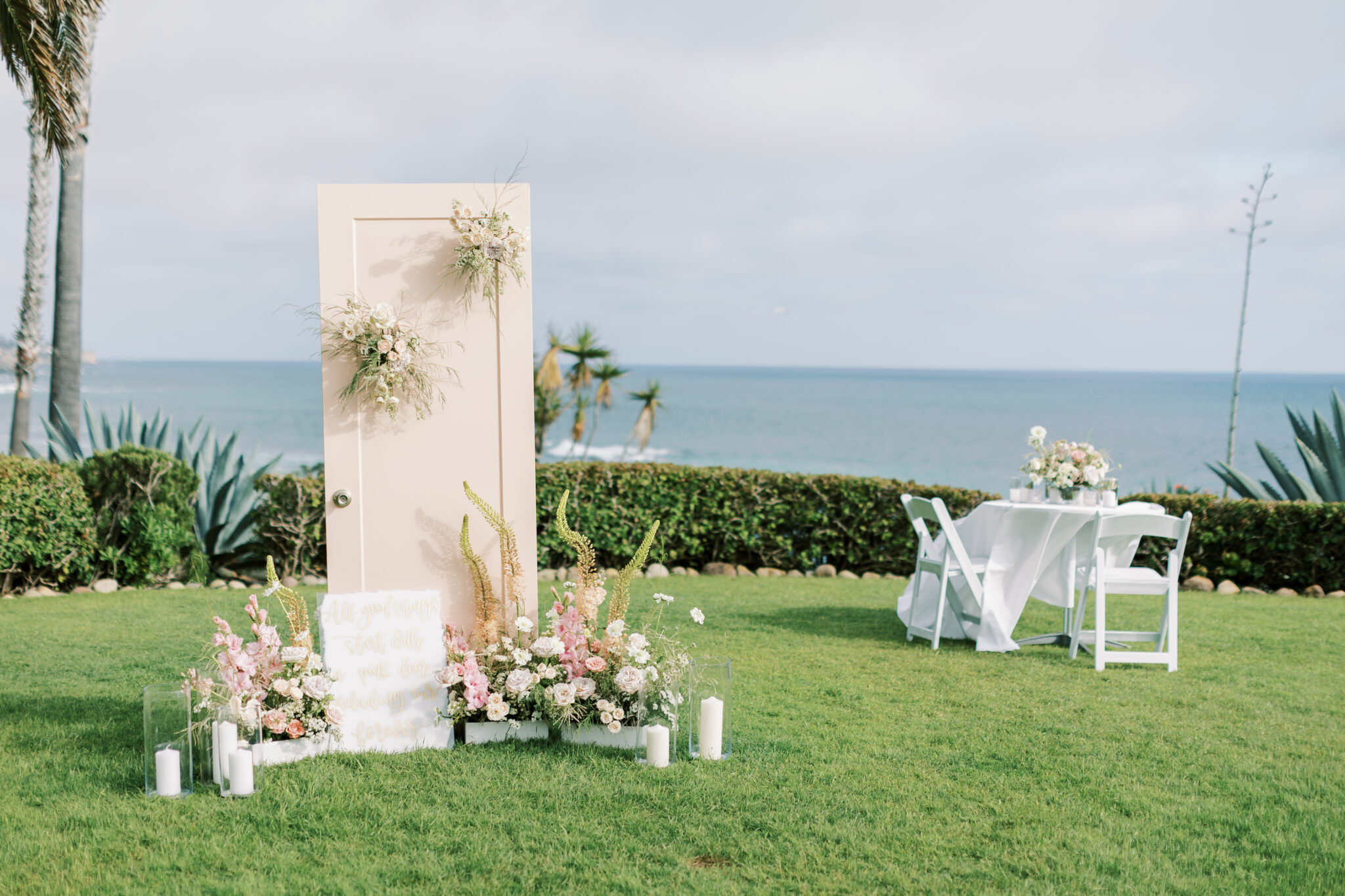 Marriage proposal pink door set up in laguna beach