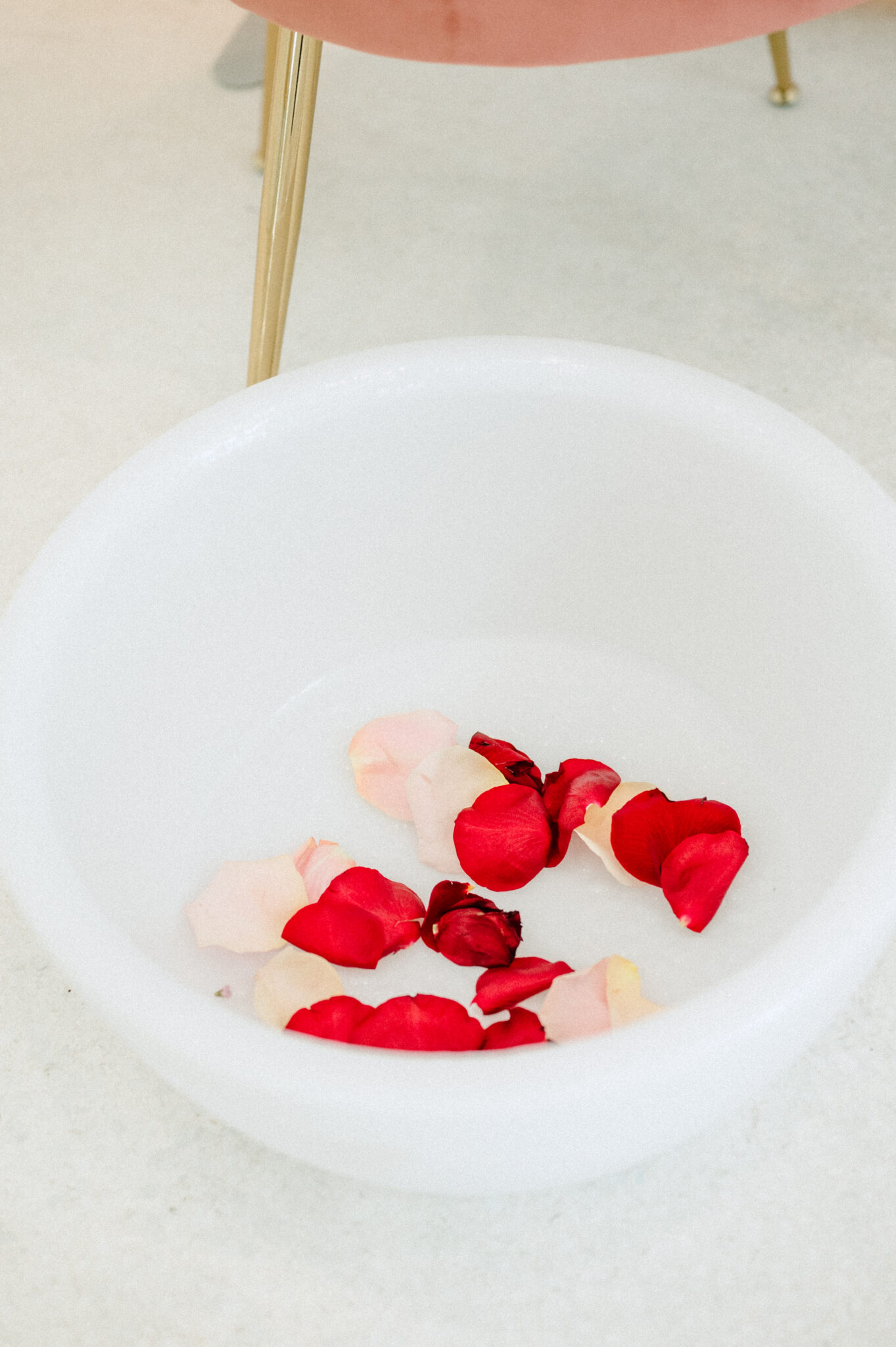 Rose petals in pedicure bowl