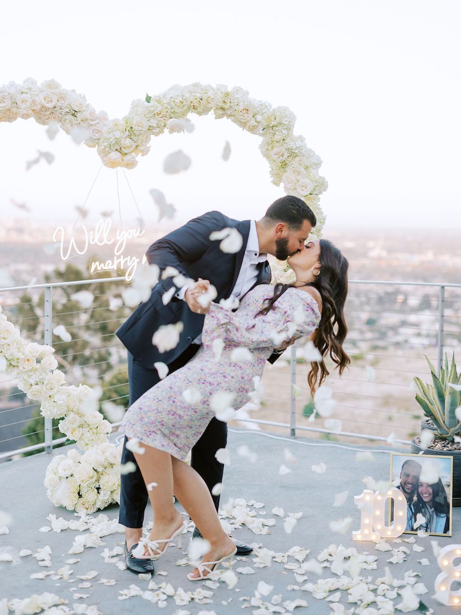 los angeles proposal rooftop set up with skyline views by the yes girls