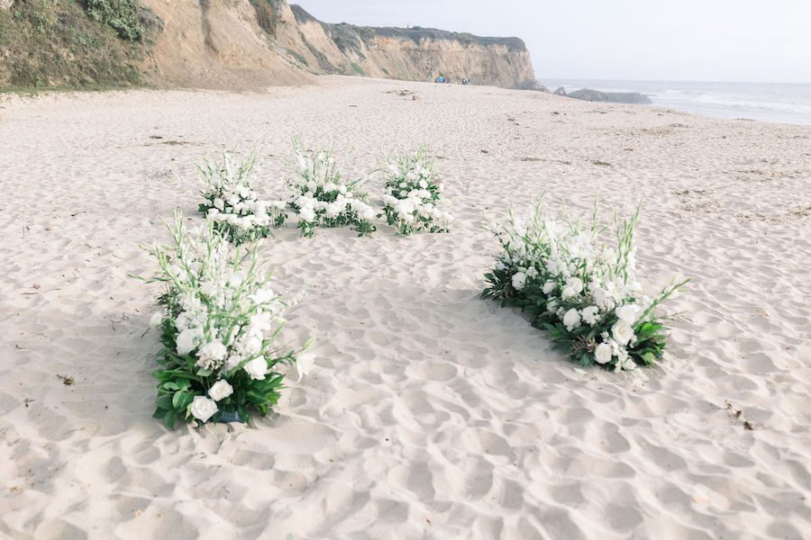 flowers in the sand beach proposal