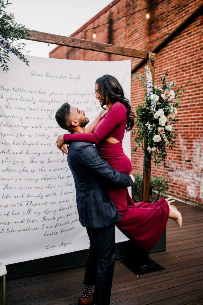 engaged couple in Washington DC rooftop