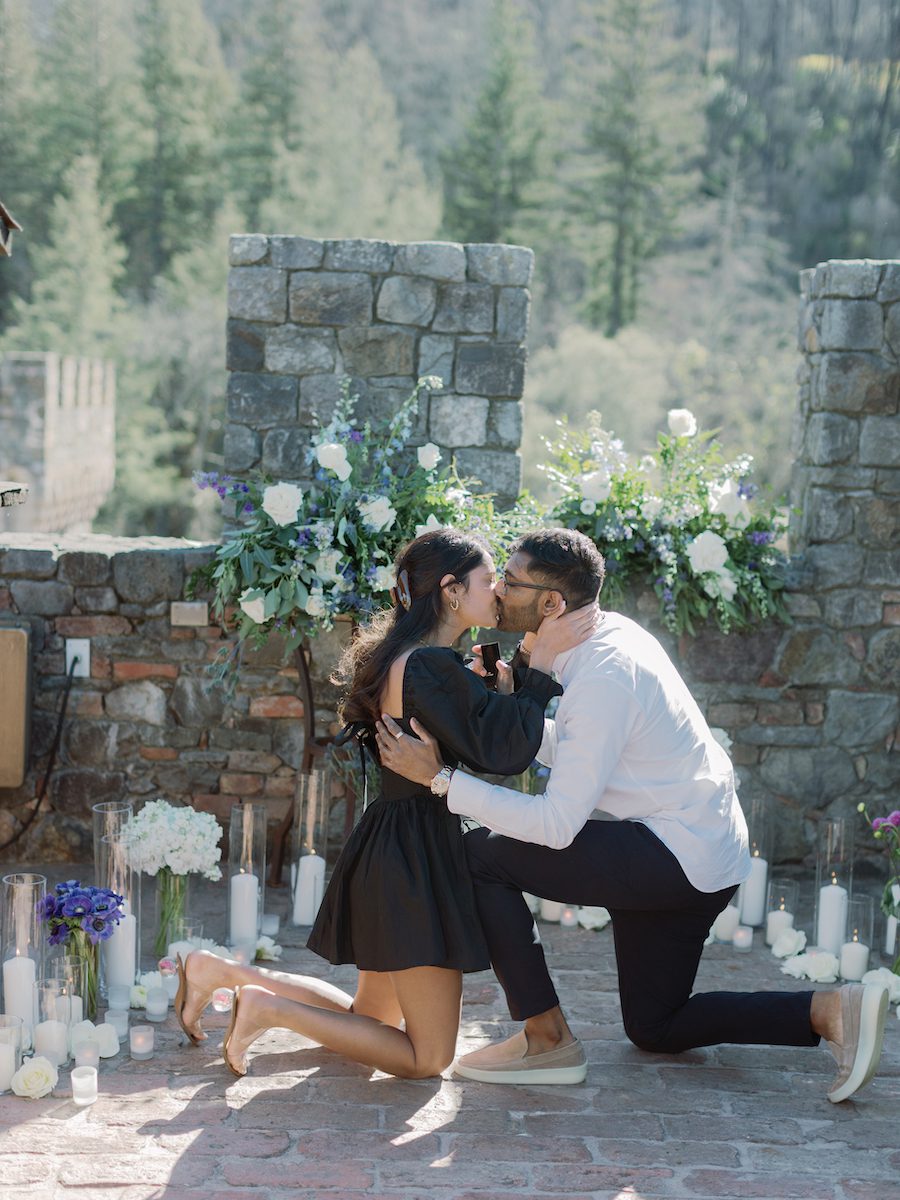 Couples Fairytale Proposal in Napa with flowers and candles