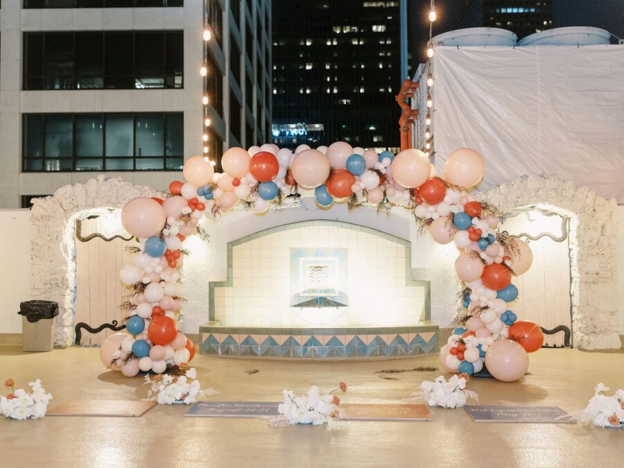 blue orange proposal blue orange balloons balloon arch proposal floral balloon arch game night proposal game board proposal rooftop proposal los angeles proposal los angeles rooftop proposal california proposal