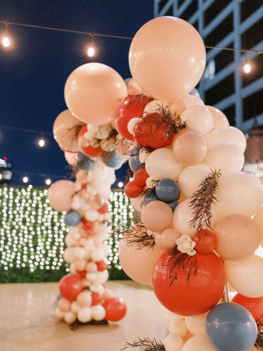 blue orange proposal blue orange balloons balloon arch proposal floral balloon arch game night proposal game board proposal rooftop proposal los angeles proposal los angeles rooftop proposal california proposal