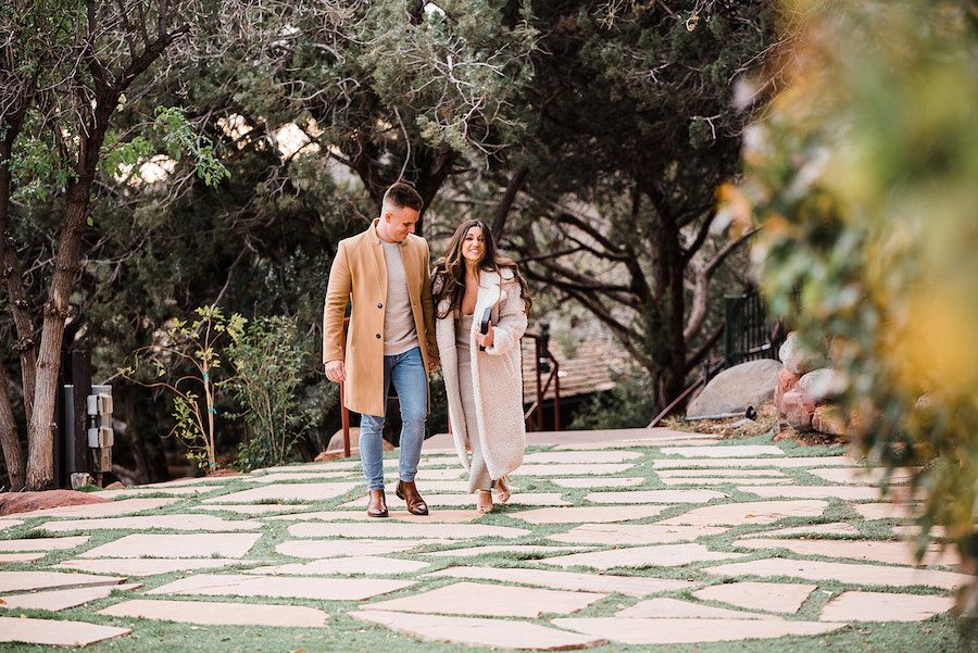 couple holding hands sedona proposal