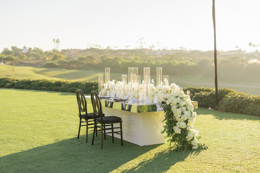 Sweetheart table for luxury 20 year anniversary and ocean view proposal in southern California