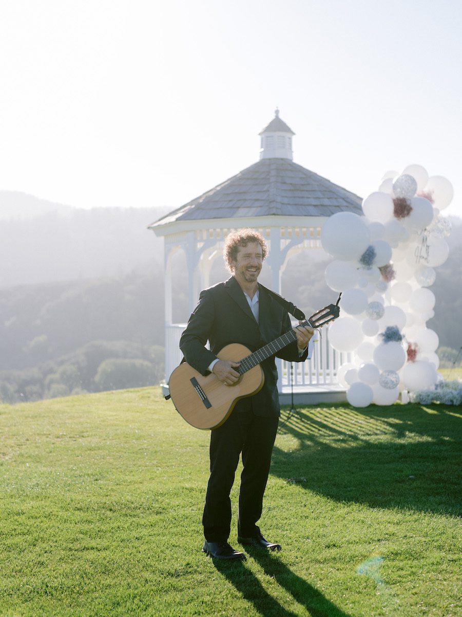 live musician at the beautiful balloon gazebo proposal in San Francisco CA