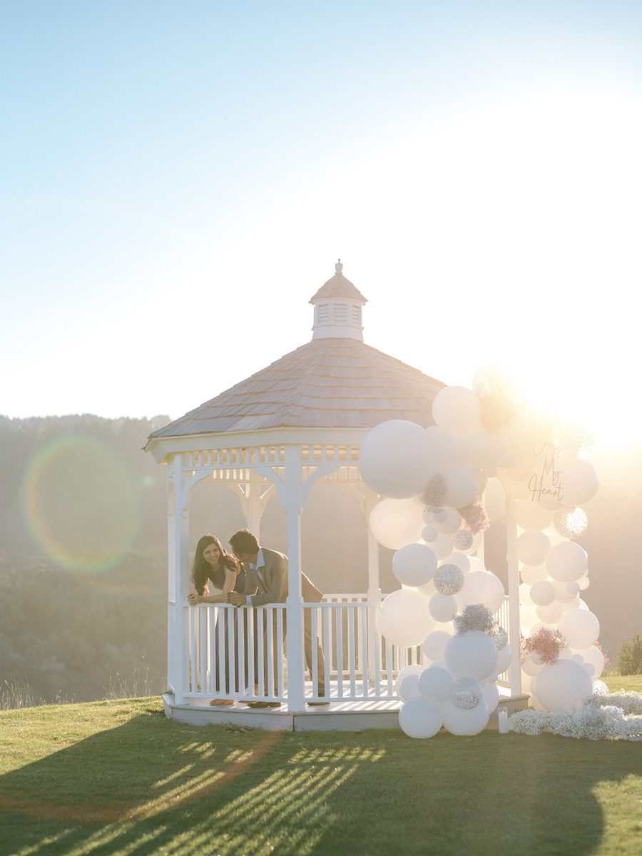 beautiful balloon gazebo proposal in San Francisco CA at sunset 