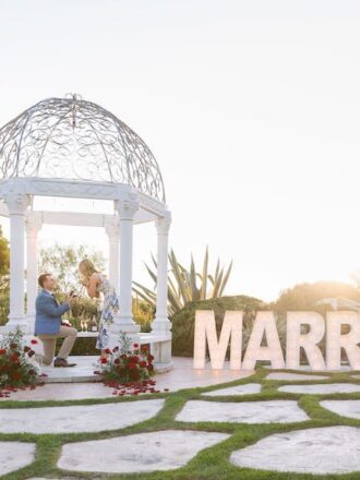 marry me sign marriage proposal at monarch beach with the yes girls