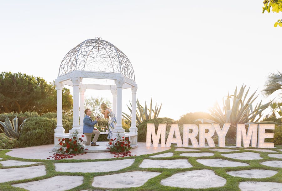 gorgeous gazebo proposal with marry me letters