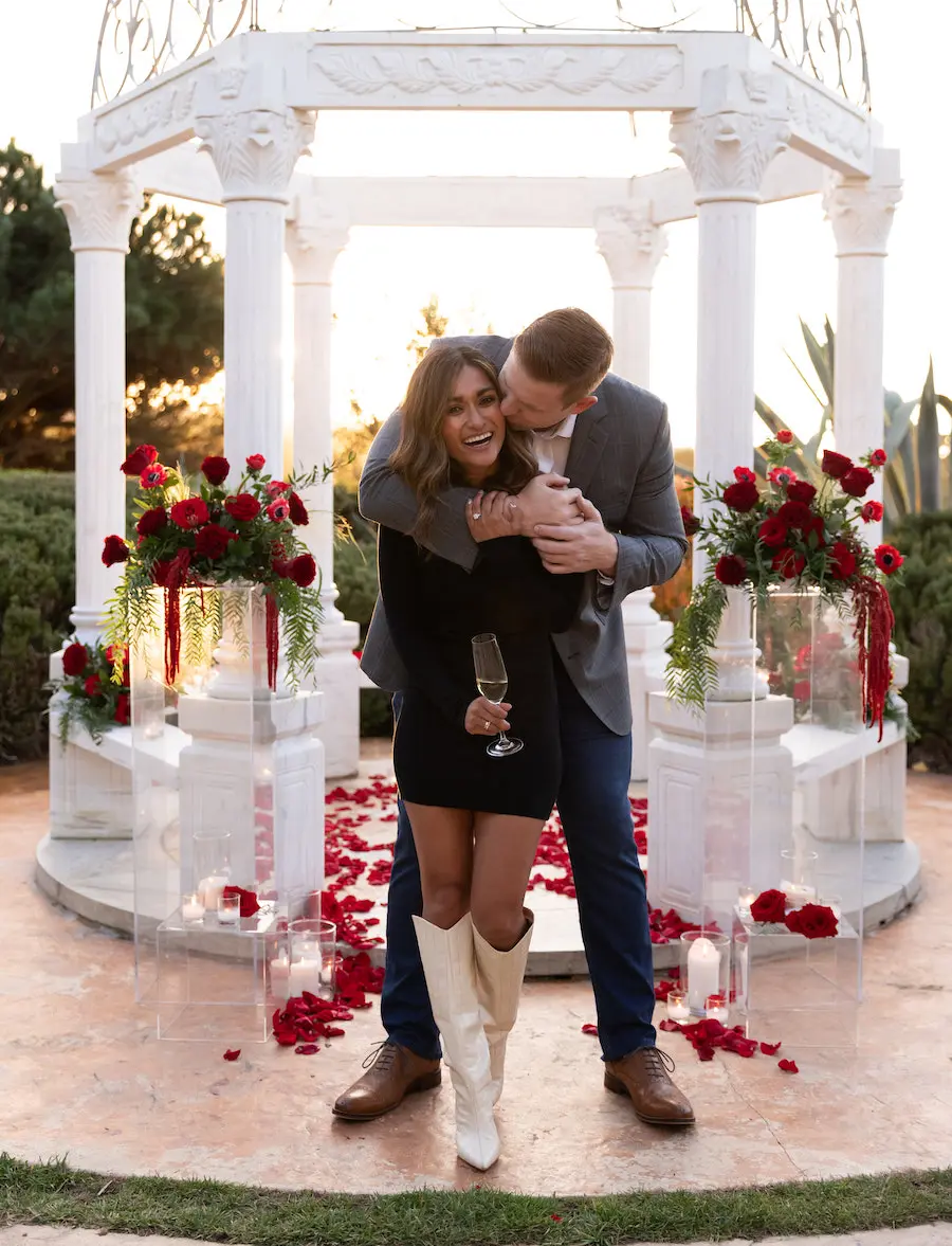 couple celebrating after their gorgeous gazebo proposal 