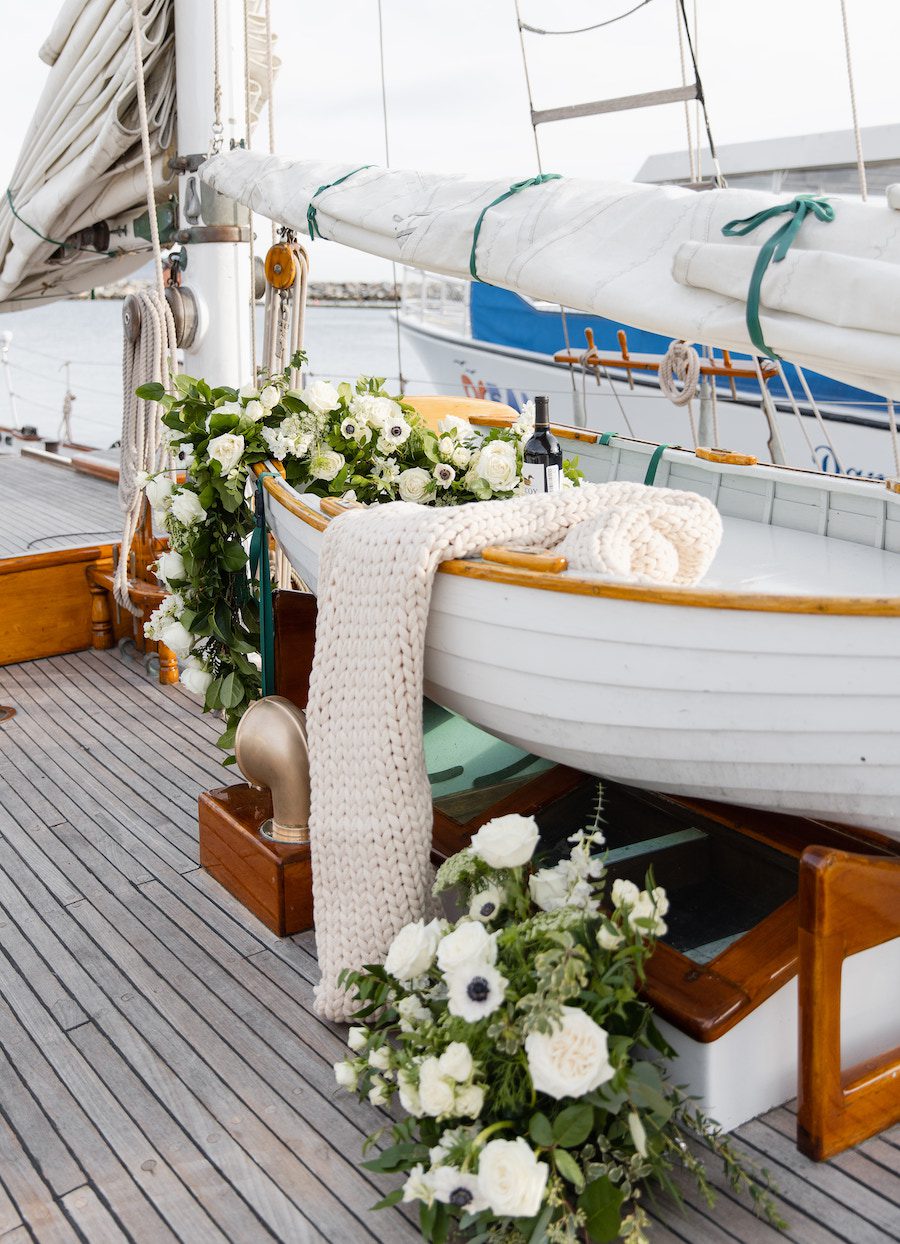 Custom decorated mini boat on the sail boat to highlight the gorgeous details