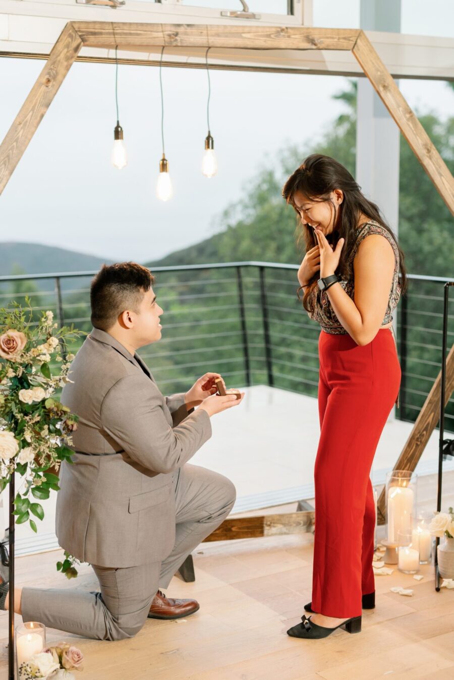 mountain views mountain proposal malibu california malibu proposal luxury proposal hexagon arch down on one knee arch hanging lights