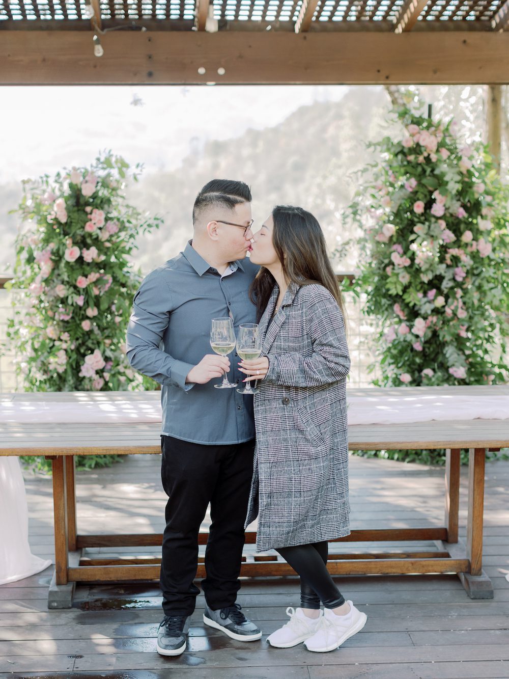 rutherford hill napa proposal location with flower arch with the yes girls