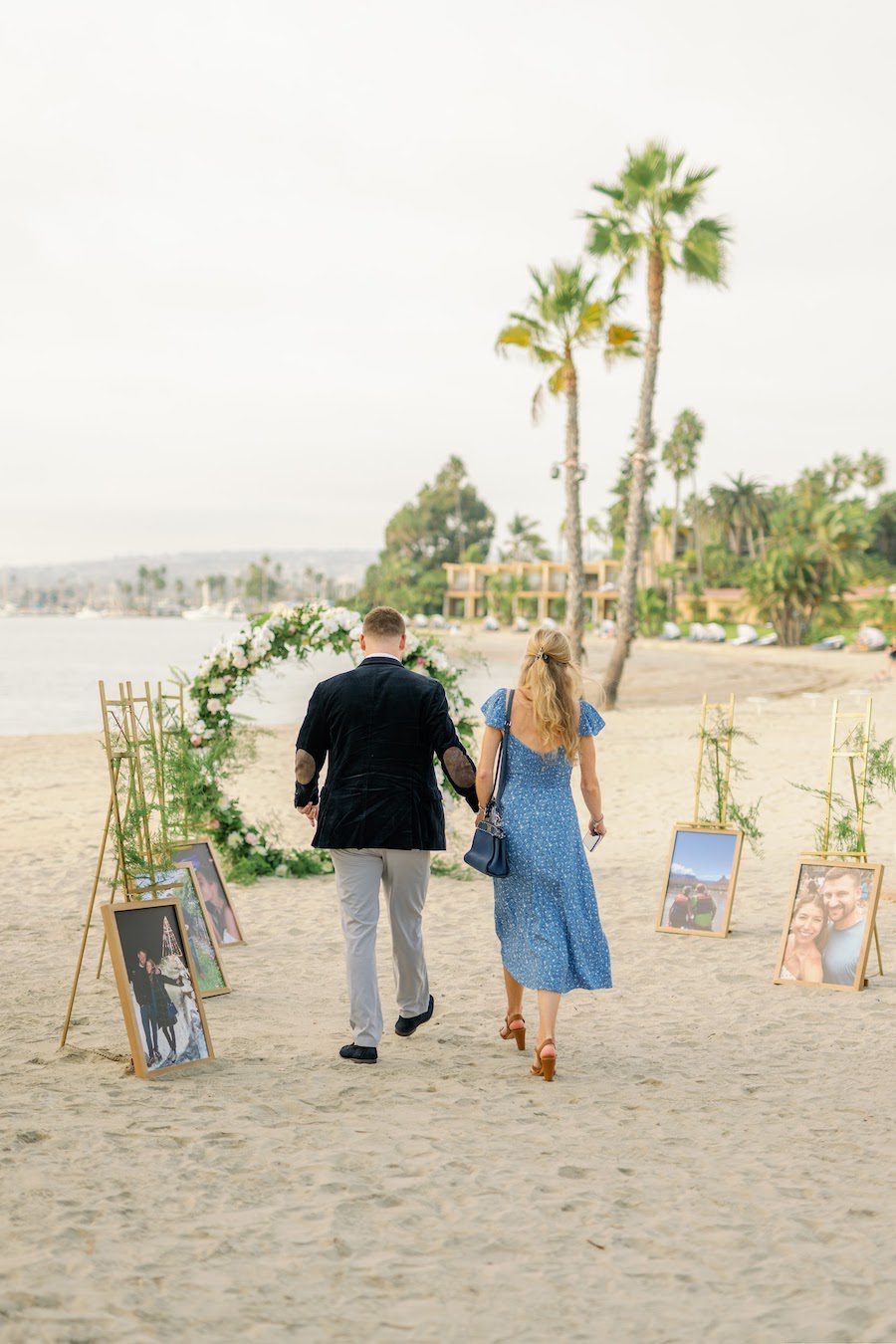 walking up to dream proposal in san diego on the beach by the yes girls