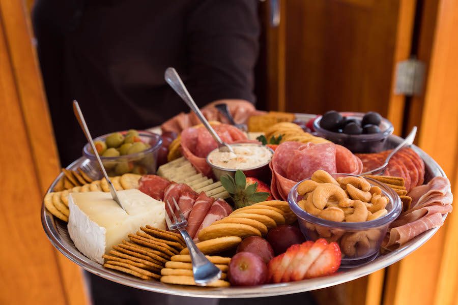 charcuterie board on yacht for wine tasting