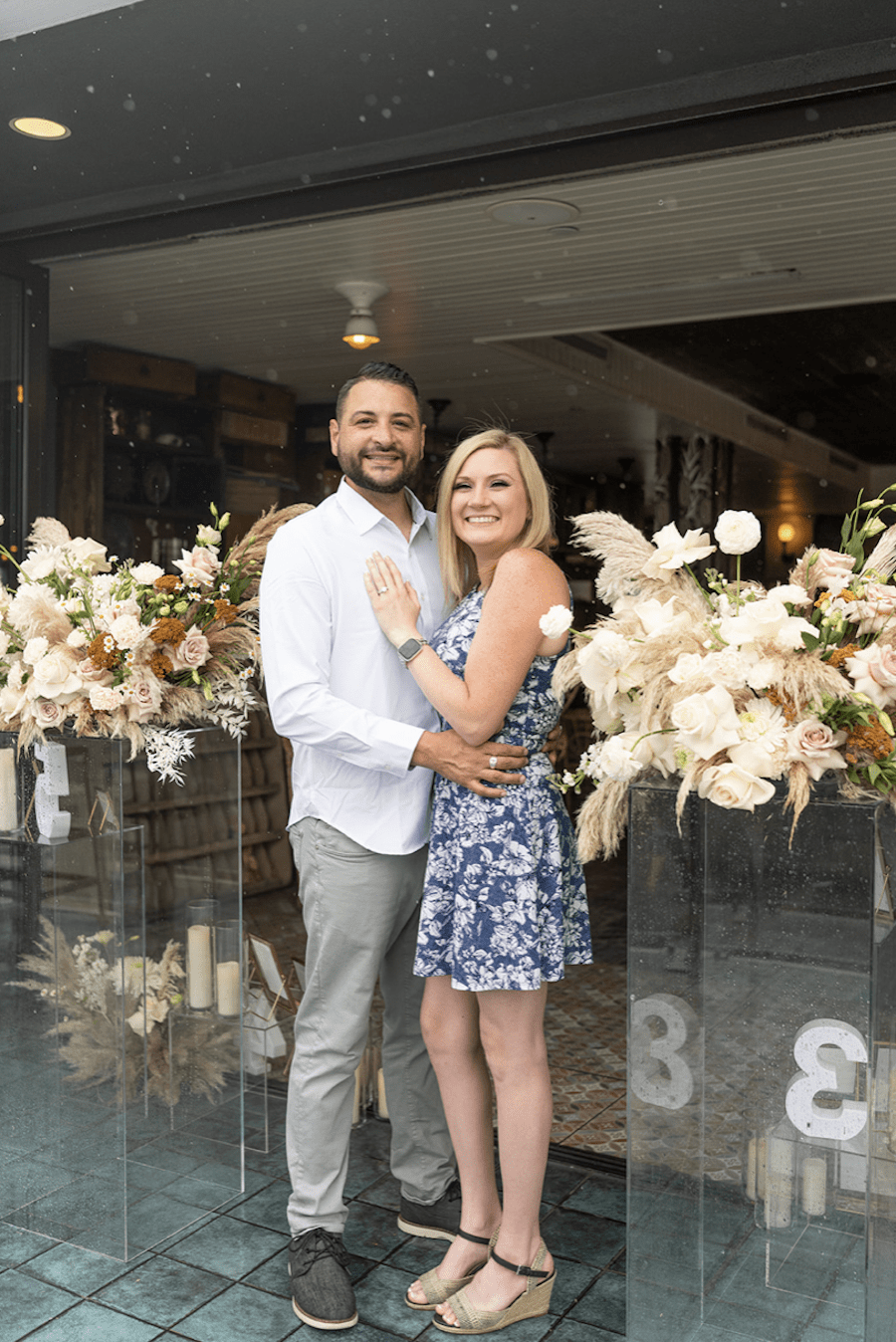 Romantic rooftop proposal in new orleans neutral florals
