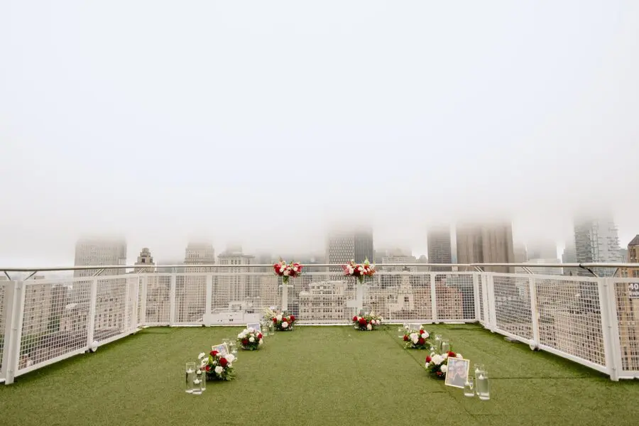 luxury proposal nyc skyline proposal rooftop proposal red flower proposal