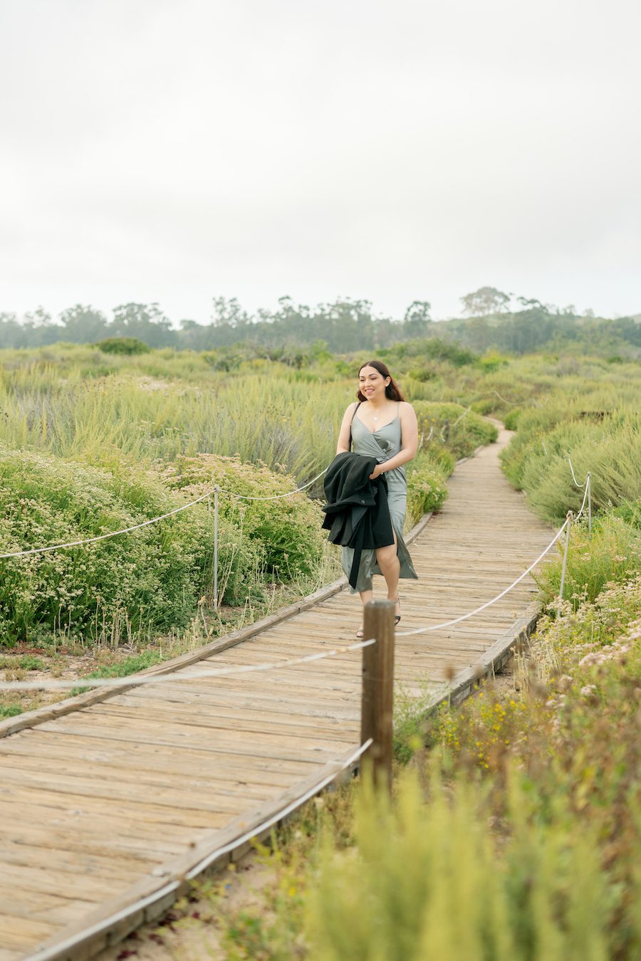 bride to be arriving at A Stunning Ocean View Picnic Proposal in OC California