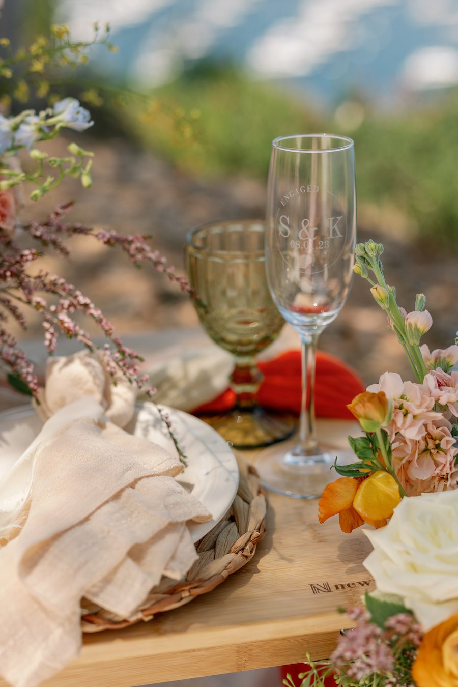 custom engraved champagne glasses from this private picnic proposal on Catalina Island