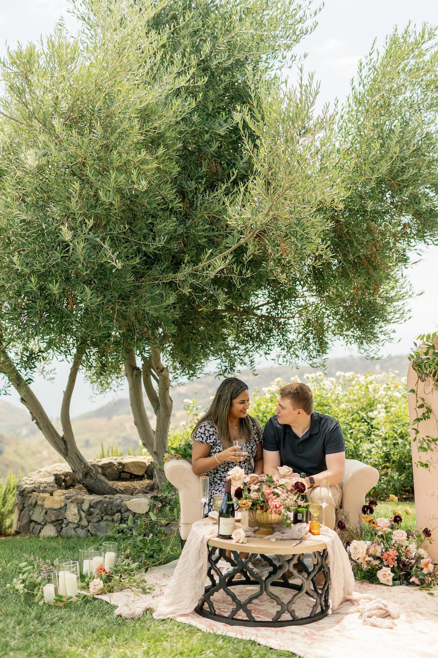 Romanic, Intimate, and Creative Malibu Proposal. With custom details and backdrops. This cozy proposal with gorgeous florals was nestled in the mountains of Malibu. 
