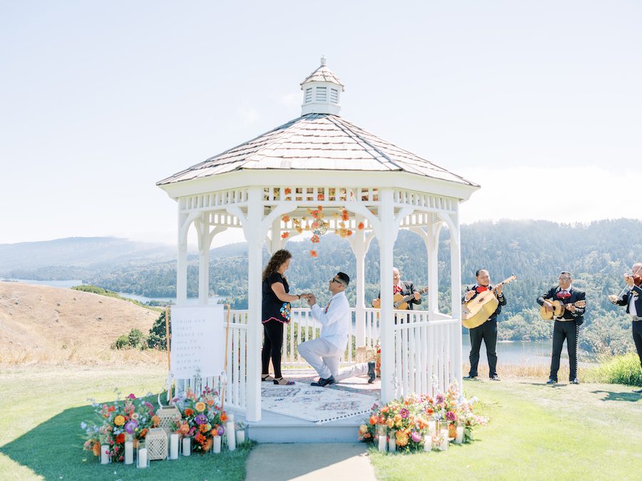 creative colorful proposal set up with marachi band and private gazebo in san francisco